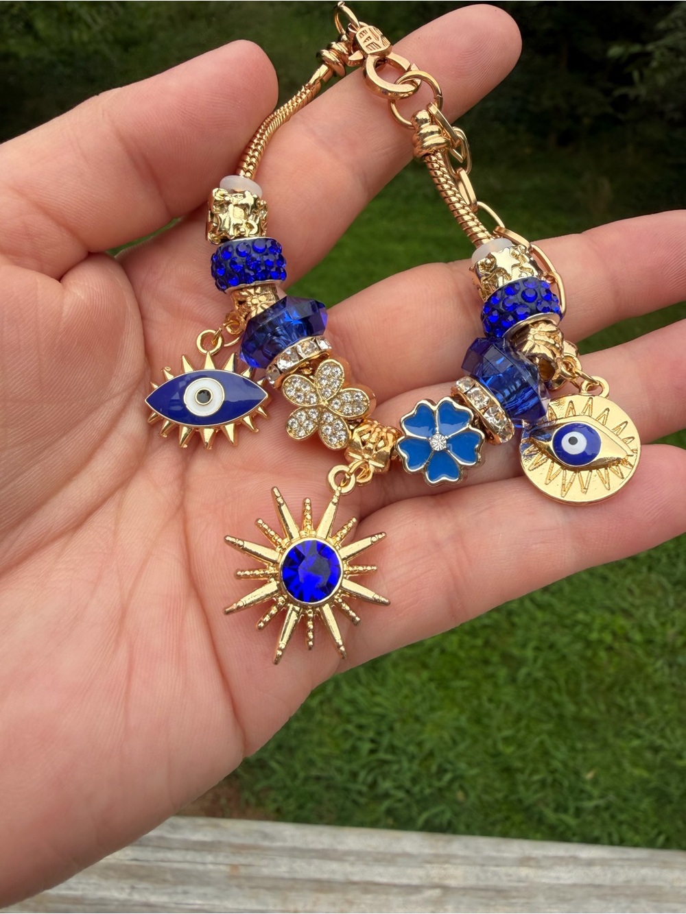 Blue and Gold Charm Bracelet with Evil Eye and Sun Charms